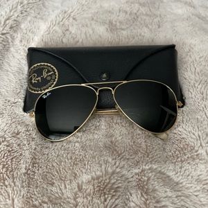 Class black aviators with gold frames